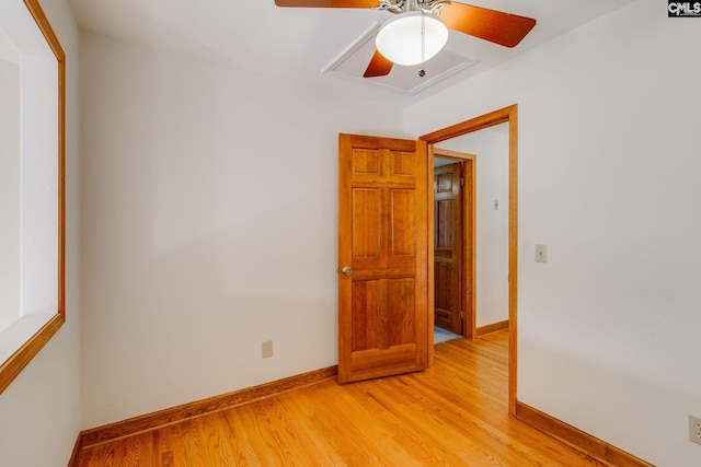 spare room featuring ceiling fan and light hardwood / wood-style floors