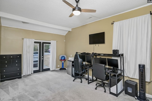 carpeted office featuring vaulted ceiling with beams, french doors, a textured ceiling, and ceiling fan