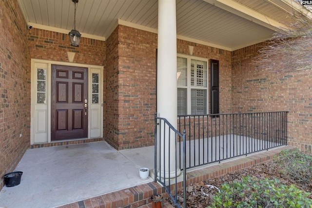 doorway to property with a porch