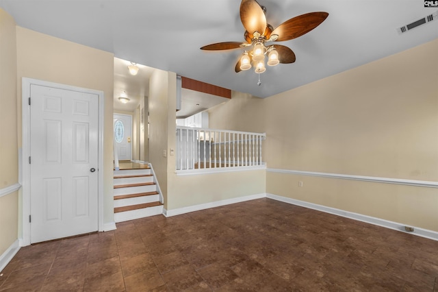 spare room with ceiling fan