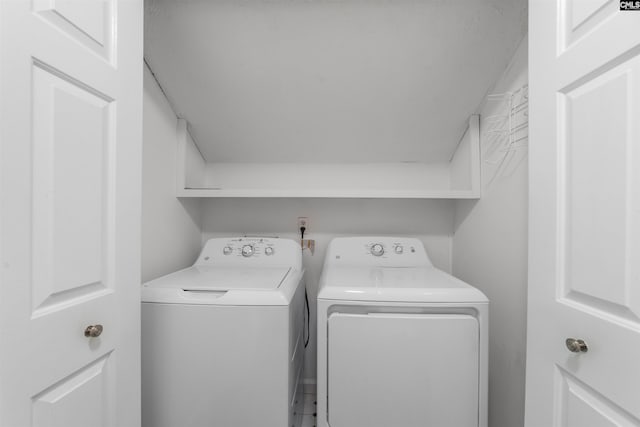 laundry room featuring washer and dryer