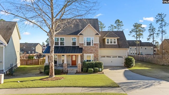 craftsman house featuring a garage, a porch, and a front lawn