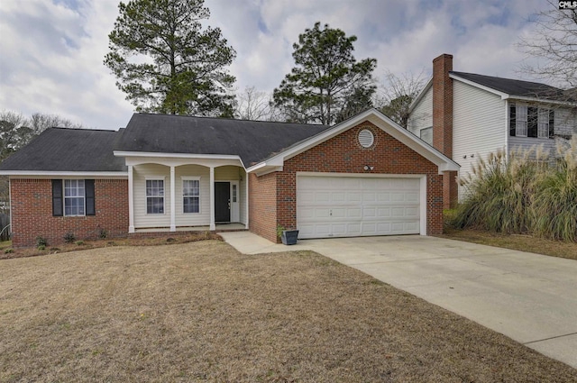 view of front of home with a garage, a front lawn, and a porch