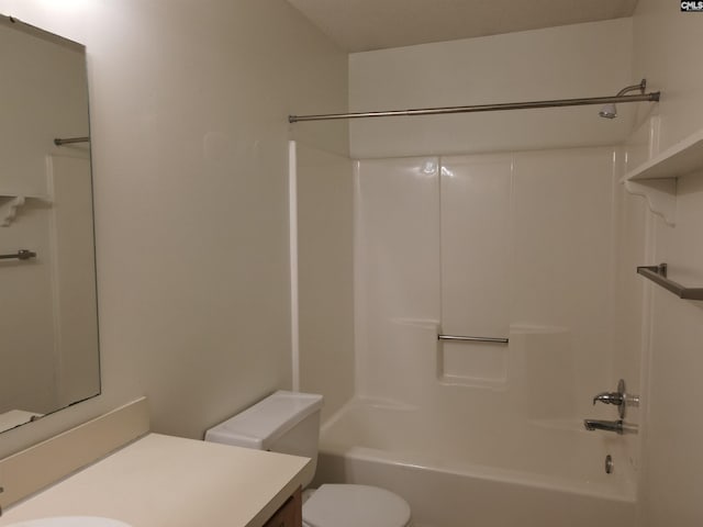 full bathroom featuring shower / bathtub combination, vanity, and toilet