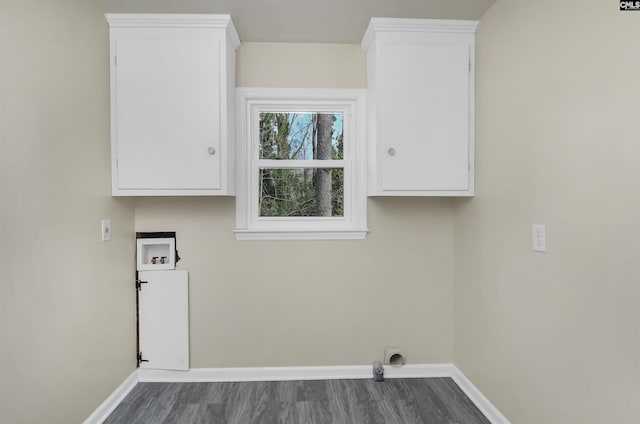 laundry area featuring washer hookup, dark hardwood / wood-style flooring, and hookup for an electric dryer