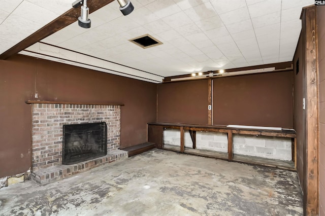 unfurnished living room with a fireplace