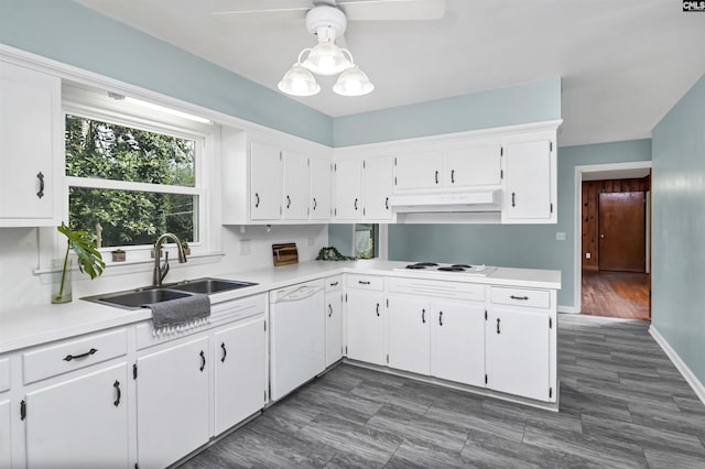 kitchen with sink, white appliances, ceiling fan, white cabinetry, and decorative light fixtures