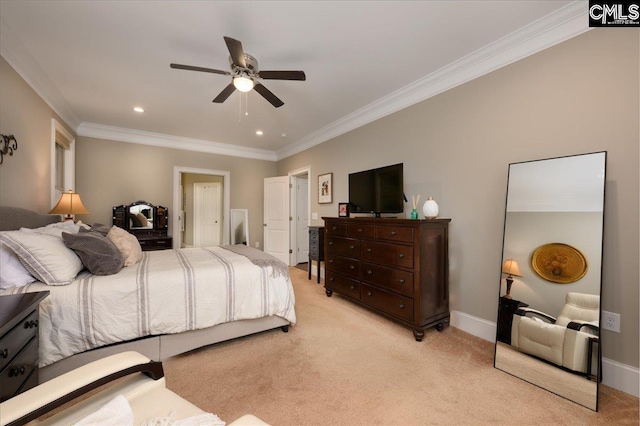 carpeted bedroom featuring crown molding and ceiling fan