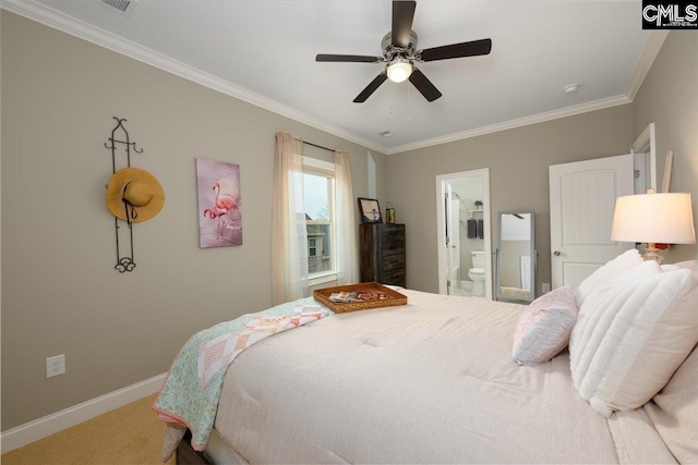 bedroom with ceiling fan, carpet flooring, ornamental molding, and connected bathroom