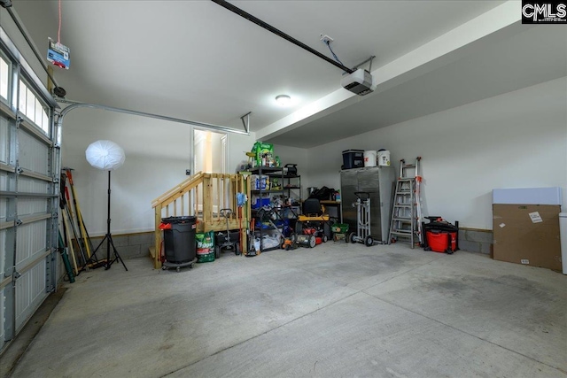 garage featuring a garage door opener