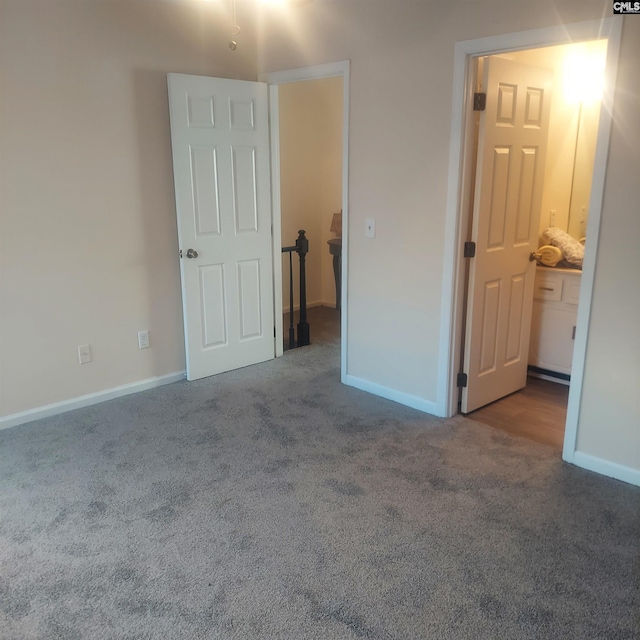 unfurnished bedroom featuring carpet flooring