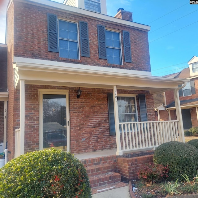 entrance to property with covered porch