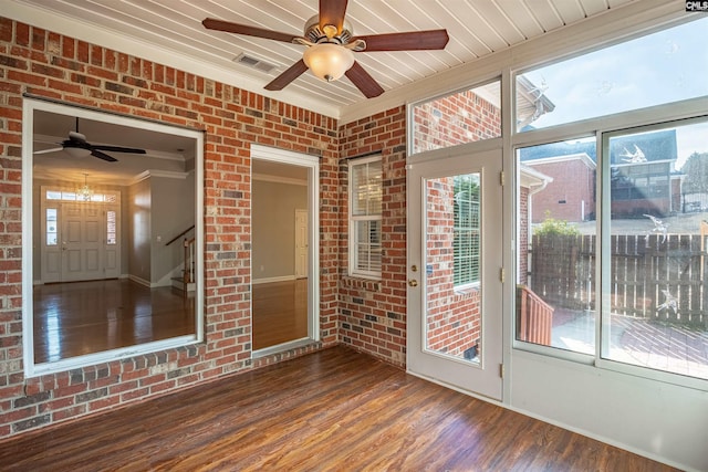 unfurnished sunroom with plenty of natural light