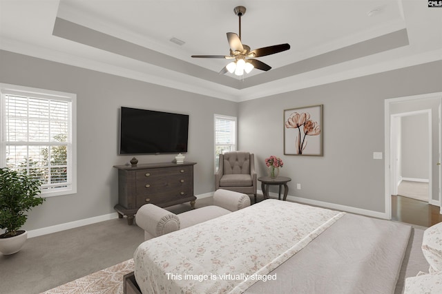 241 Highgrove Cir, West Columbia, SC 29170 - carpeted bedroom featuring a tray ceiling, ornamental molding, and ceiling fan