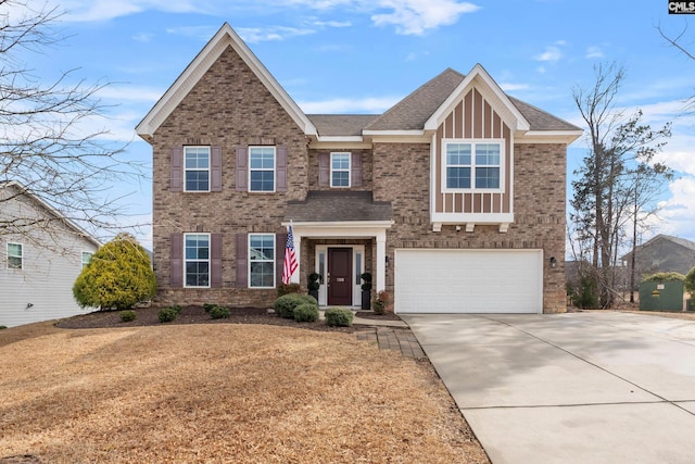 view of front of property with a garage