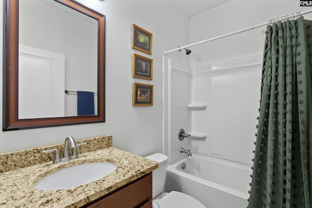 full bathroom with vanity, toilet, and shower / bath combo with shower curtain