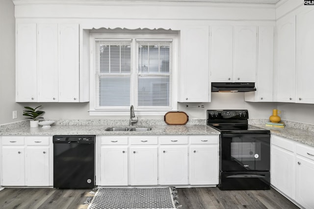 kitchen featuring sink, dark wood-type flooring, black appliances, light stone countertops, and white cabinets