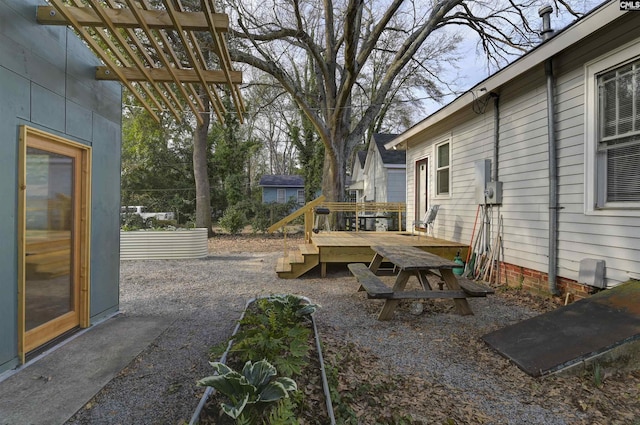 view of patio with a wooden deck