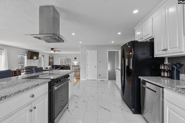 kitchen featuring white cabinetry, island exhaust hood, stainless steel dishwasher, electric range, and light stone countertops