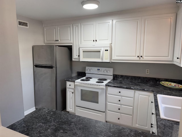 kitchen featuring white cabinetry, white appliances, and sink