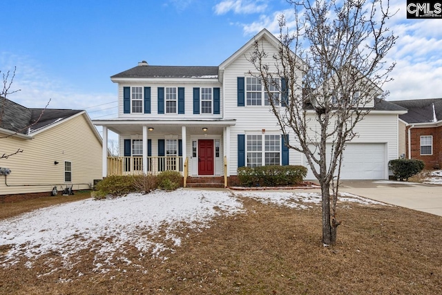 view of front of home featuring a garage and covered porch