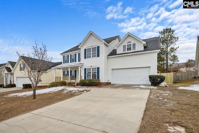 front of property featuring a garage and a porch