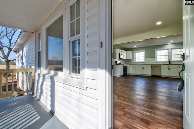 view of side of home with sink