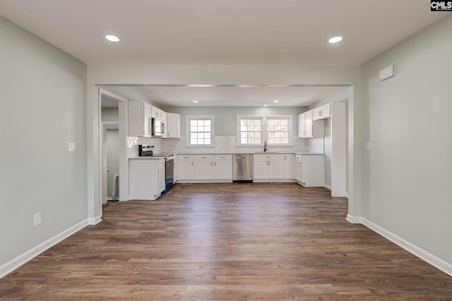 interior space featuring dark wood-type flooring and sink