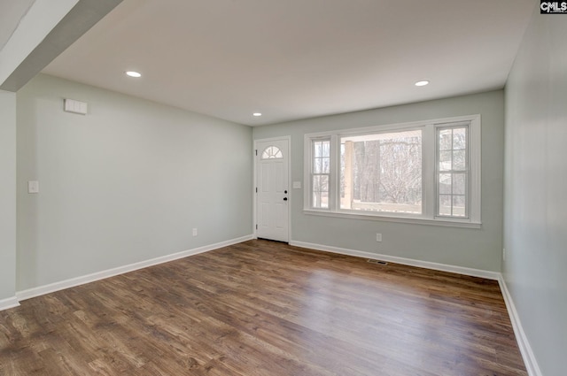 foyer entrance featuring dark hardwood / wood-style flooring