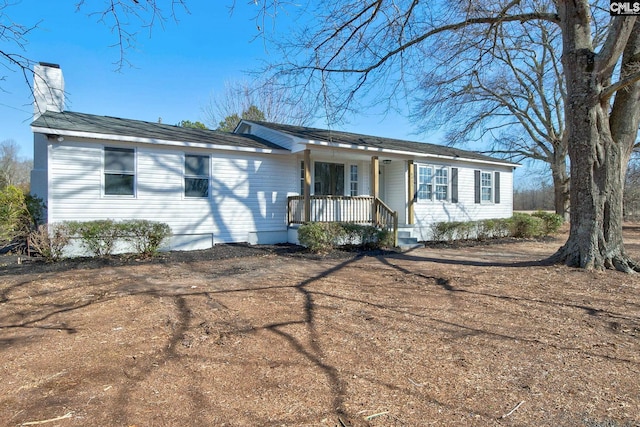 ranch-style home featuring covered porch