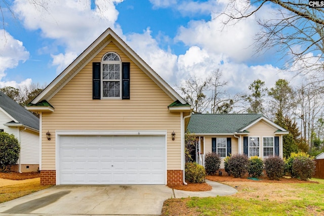 front of property with a garage