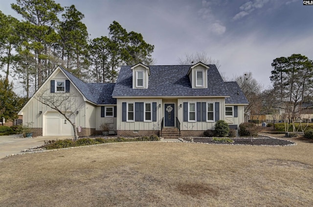 cape cod home with a garage