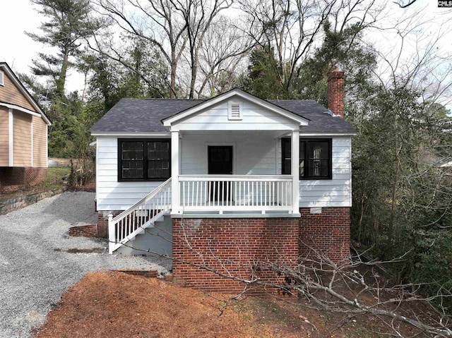 bungalow-style home featuring covered porch