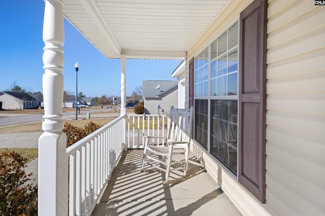 balcony featuring covered porch