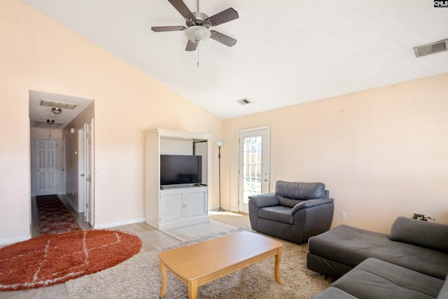 living room featuring high vaulted ceiling, light hardwood / wood-style floors, and ceiling fan