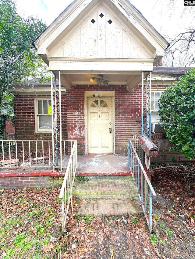 entrance to property with a porch