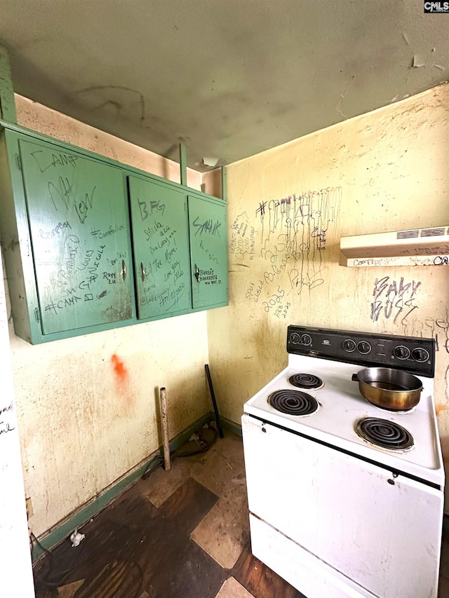 kitchen featuring white electric range and green cabinets