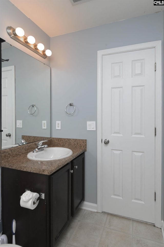 bathroom featuring vanity and tile patterned floors