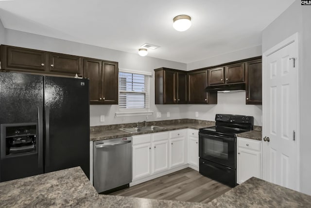 kitchen featuring sink, dark brown cabinets, dark hardwood / wood-style floors, black appliances, and white cabinets