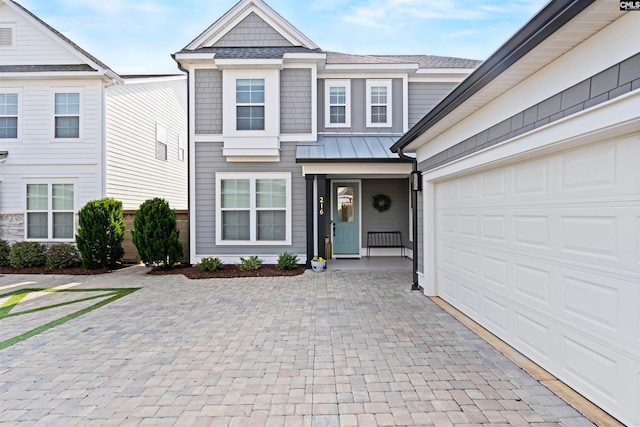 view of front of property featuring a garage