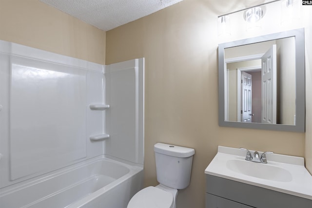 full bathroom with vanity, shower / bathing tub combination, toilet, and a textured ceiling