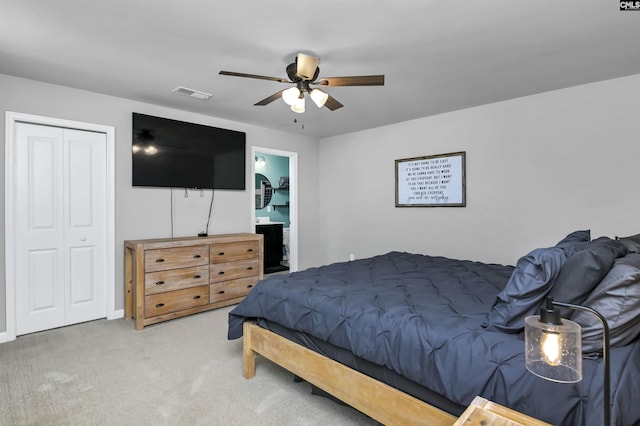 bedroom featuring carpet flooring, ceiling fan, and a closet