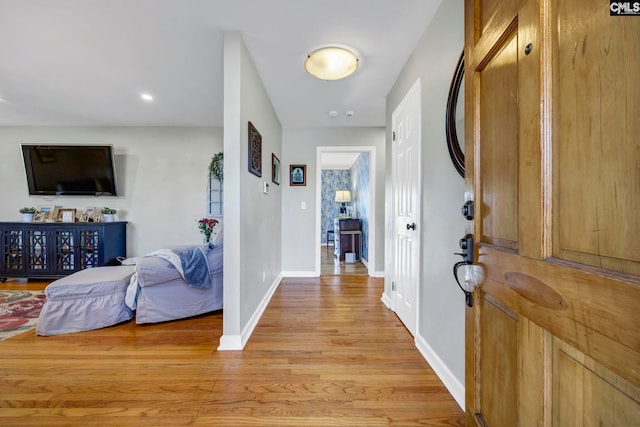 entrance foyer with light hardwood / wood-style flooring