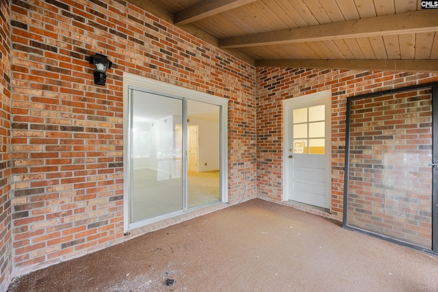 property entrance featuring a patio