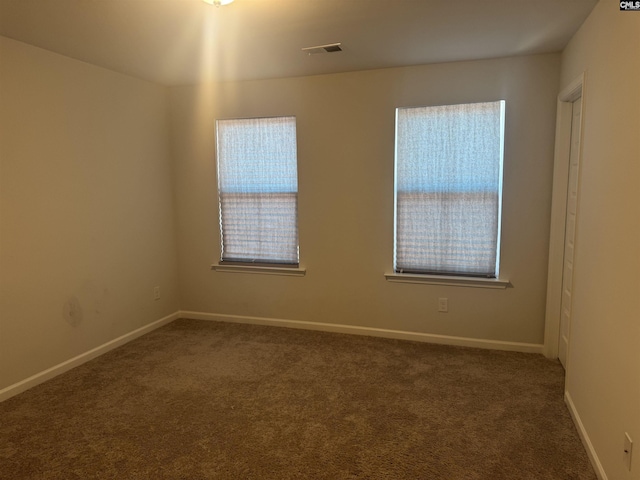 view of carpeted spare room