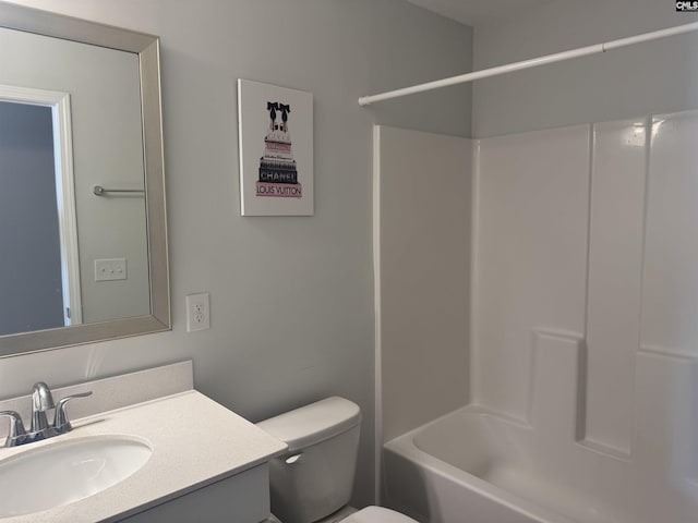 full bathroom with vanity, toilet, and tub / shower combination