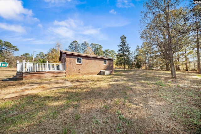 104 Brandon Rd, Clinton, SC 29325 - view of side of home featuring a deck and central air condition unit