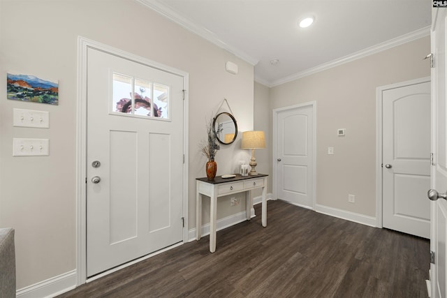 foyer featuring ornamental molding and dark hardwood / wood-style flooring