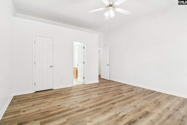 unfurnished bedroom with ceiling fan, connected bathroom, and light hardwood / wood-style floors