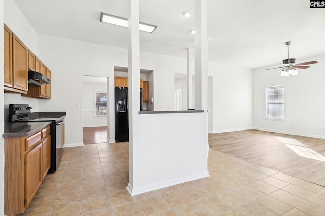 kitchen with light tile patterned floors, ceiling fan, and black appliances